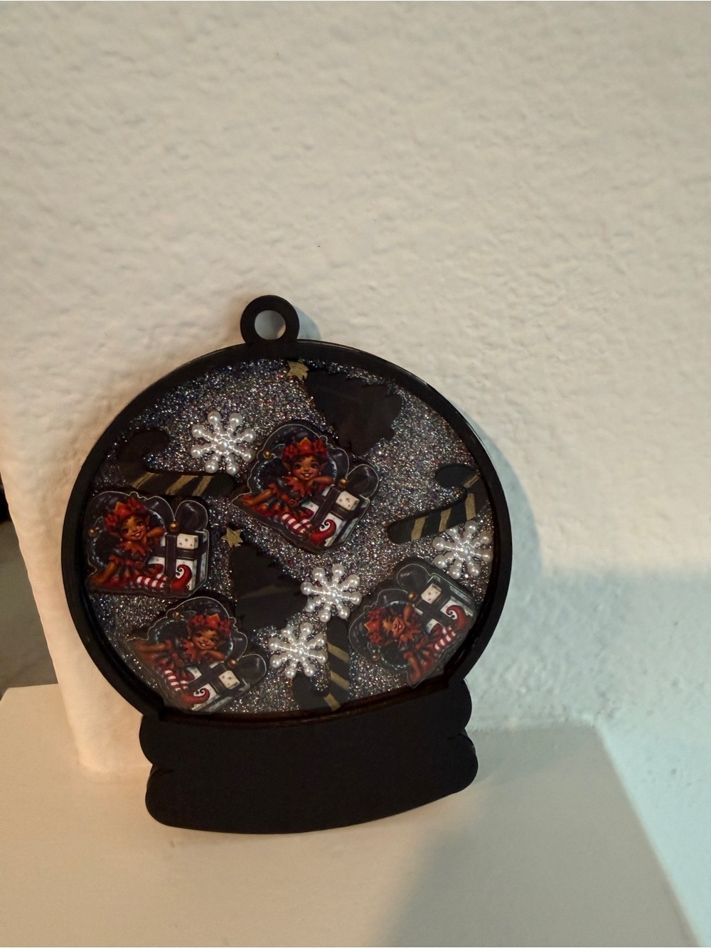 Black Glitter Snow Globe-Style Holiday Ornament with Festive Accents